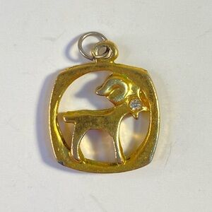 Vintage goldtone Capricorn zodiac pendant with rhinestone